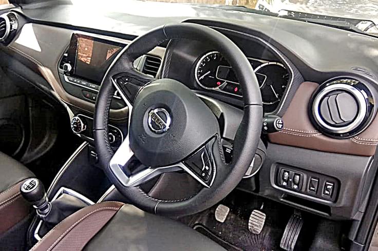 Dashboard gets leather and black plastics. Dashboard gets leather and black plastics.