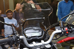 The windscreen is supported by a large bracket.