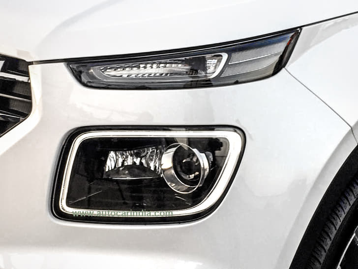 Dual headlight setup looks very new age.