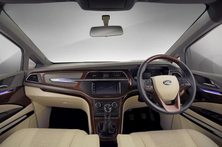 Dash has been covered in faux leather and gets wood inserts.