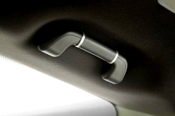 The grab handle has been re-trimmed in leather.