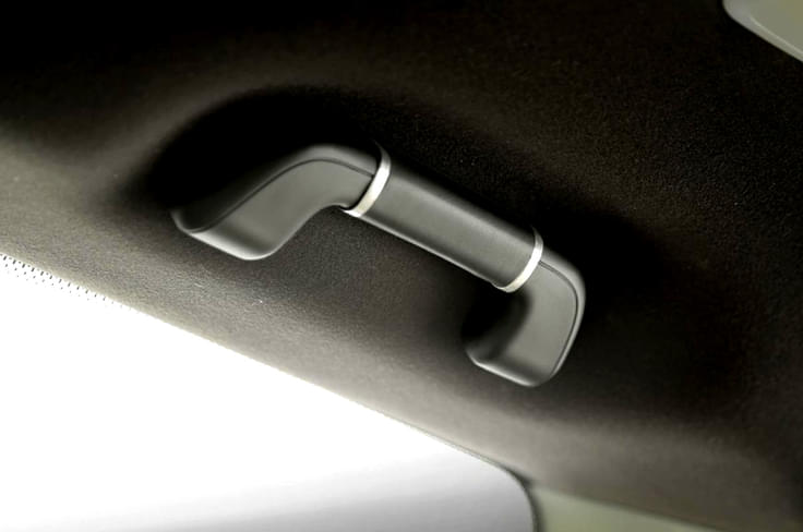 The grab handle has been re-trimmed in leather. The grab handle has been re-trimmed in leather.