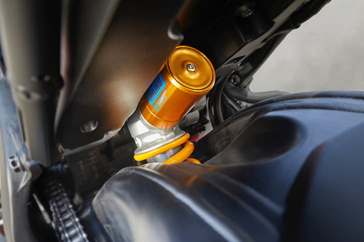 At the rear there's Ohlins TTX36 Smart-EC shock mounted directly to the back of the engine