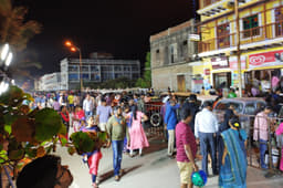 Crowds throng the beach.