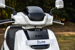 The iQube gets a DRL on the upper head with the headlight on the front apron.