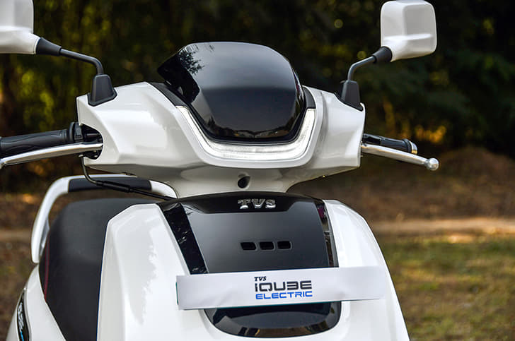 The iQube gets a DRL on the upper head with the headlight on the front apron.