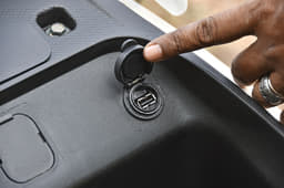 The under-seat area also houses a USB charge port.