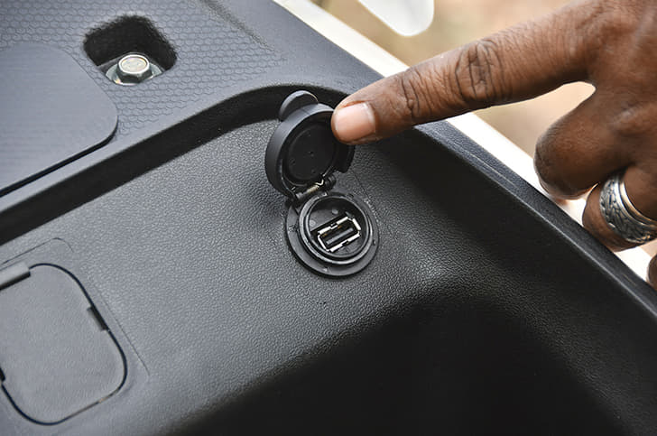 The under-seat area also houses a USB charge port.