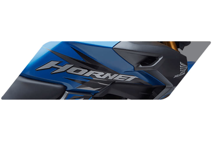 Aggressive styling is accentuated by the bold tank and faux air-vents.