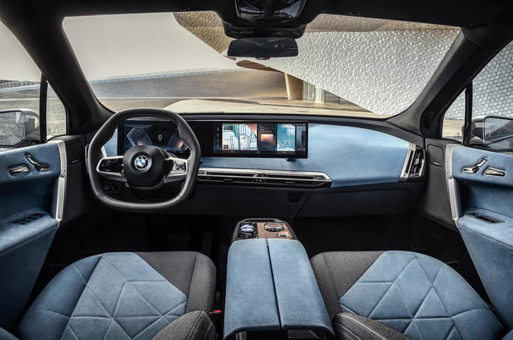 The cabin features the use of recycled plastics with the dashboard dominated by a curved display housing the instrumentation and infotainment functions The cabin features the use of recycled plastics with the dashboard dominated by a curved display housing the instrumentation and infotainment functions