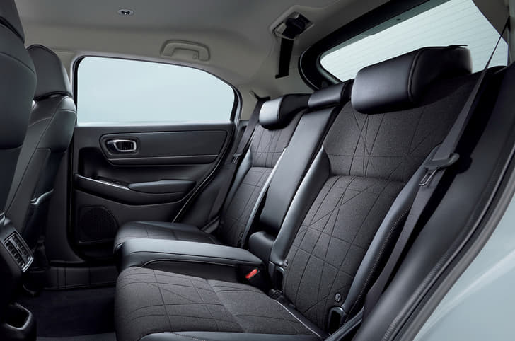 Two occupants should be able to sit in comfort. Seat-base for middle passenger is raised.