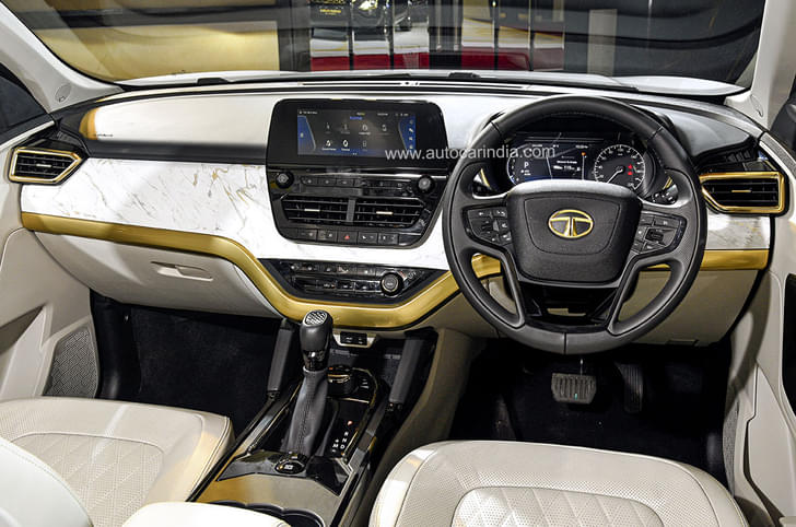 Tata Safari More notable gold highlights and white marble like finish in the 'White Gold' finished models.