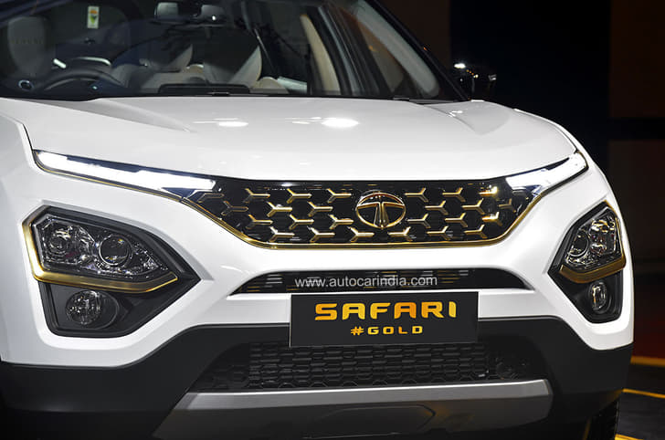 Grille inserts, headlamp trim and badging all finished in gold.