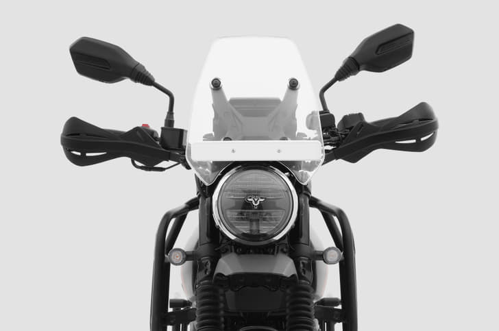 The round headlight looks crisp, fairly compact, and houses an LED bulb.