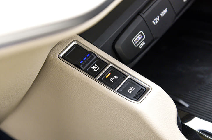 Kia Carens ventilated seats button