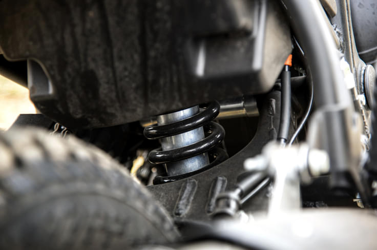 The Scram 411 has a link-type monoshock with 180mm wheel travel. The Scram 411 has a link-type monoshock with 180mm wheel travel.