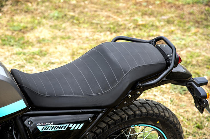 The Scram 411 has a single-piece seat instead of the split seat on the Himalayan. The Scram 411 has a single-piece seat instead of the split seat on the Himalayan.