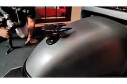 Another noteworthy design element is the three-pronged fender ornament.