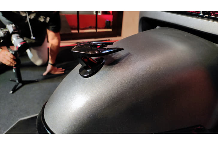 Another noteworthy design element is the three-pronged fender ornament.