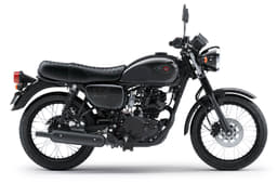 The rounded fuel-tank and side panels, wire-spoke wheels and circular headlight give the bike a simple, rugged, old-school look.