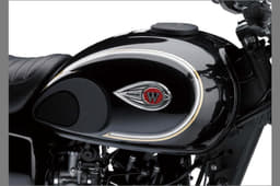 The teardrop-shaped fuel-tank wears a neat-looking 'W' logo and features attractive pinstripes.