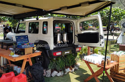 Maruti Suzuki Jimny 5-door White with camping gear.