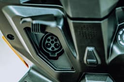 The charging port sits on the back of the apron and 0 to 80% takes 5hr54min using the home charger.