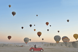 Amazing spectacle of over 100 hot air balloons taking off in Cappadocia Turkey.
