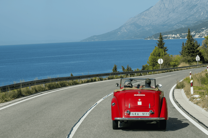 Scenic Adriatic sea on one side and mountains on the other in Croatia.