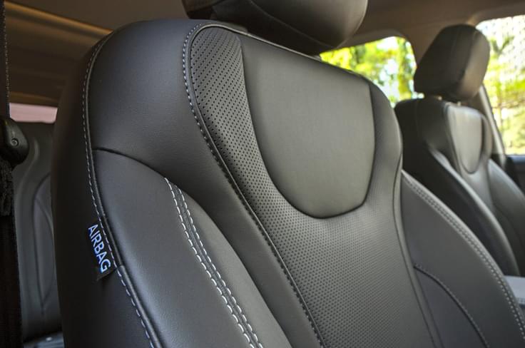 Contrast white stitching with the black seats. Contrast white stitching with the black seats.