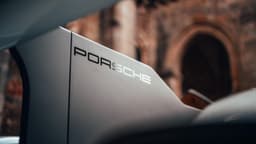 Porsche 963 wing connector painted in satin black