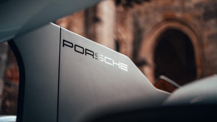 Porsche 963 wing connector painted in satin black