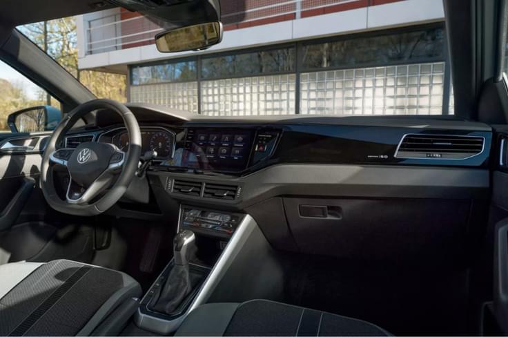 Its interior gets ambient lights, black headliner and a heating function for front seats. Edition 50 Polo interior shot