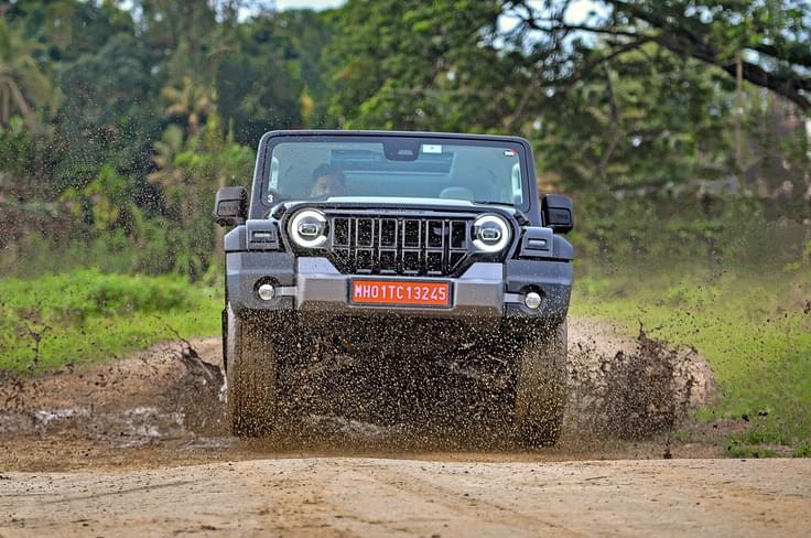 The Thar Roxx is underpinned by a new 4G body-on-frame chassis. Mahindra Thar Roxx offroading exterior front