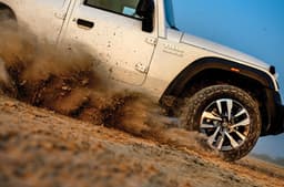 Mahindra Thar Roxx offroading exterior dust storm