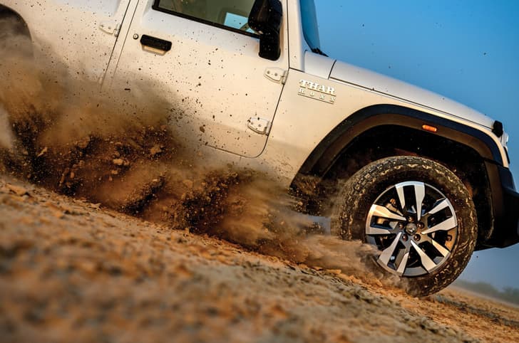 Mahindra Thar Roxx offroading exterior dust storm
