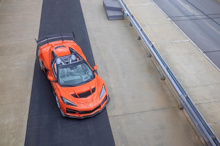 Chevrolet Corvette ZR1X orange top view on track Chevrolet Corvette ZR1X orange top view on track