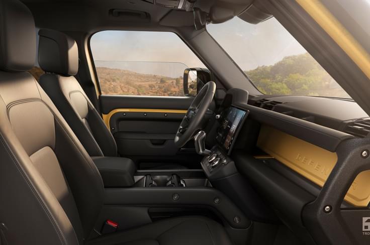 Interior gets new Ebony Eindsor leather upholstery and illuminated sill plates Defender 110 Tropy Edition interior
