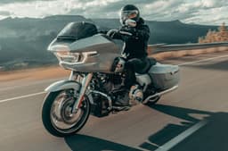Harley-Davidson Road Glide front left action shot in field