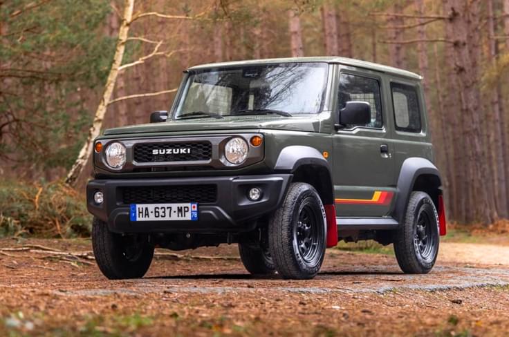 Suzuki Jimny 55th Anniversary Edition exterior in forest Suzuki Jimny 55th Anniversary Edition exterior in forest