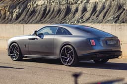 rolls royce spectre black badge rear in field