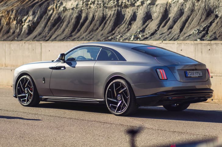 rolls royce spectre black badge rear in field