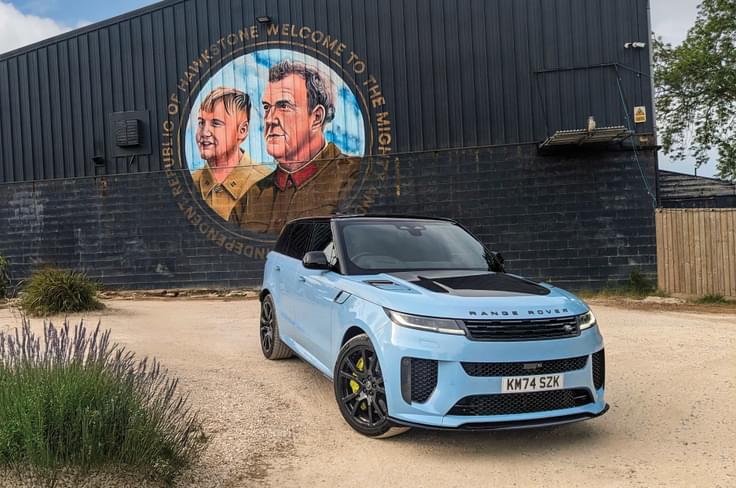 SV variant gets a healthy splash of carbon fibre trim all around. Range Rover Sport SV Edition Two side profile