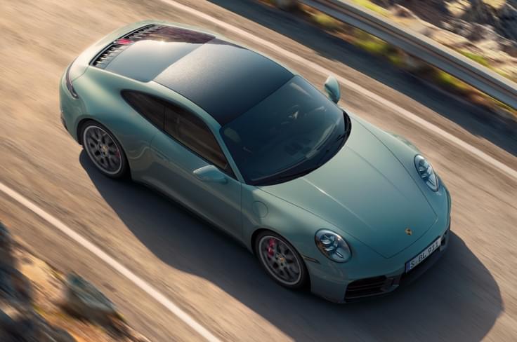 2025 Porsche 911 Carrera 4S Coupe front top action 2025 Porsche 911 Carrera 4S Coupe front top action