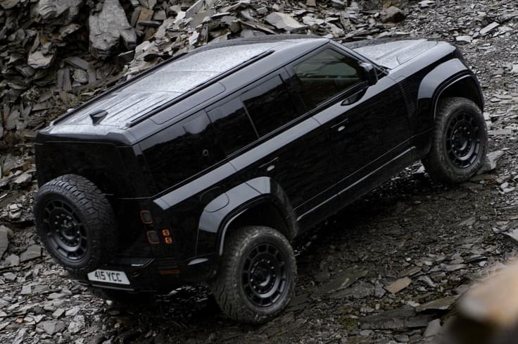 defender octa black edition rear three quarter defender octa black edition in field