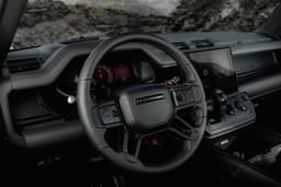 defender octa black edition in field