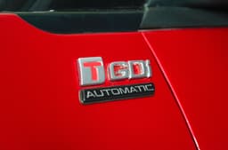 Mahindra XUV 3XO REVX A TGDi automatic badge front fender