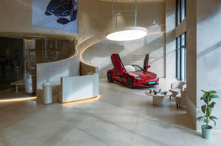 red MG cyberster in a mg select showroom red MG cyberster in a mg select showroom
