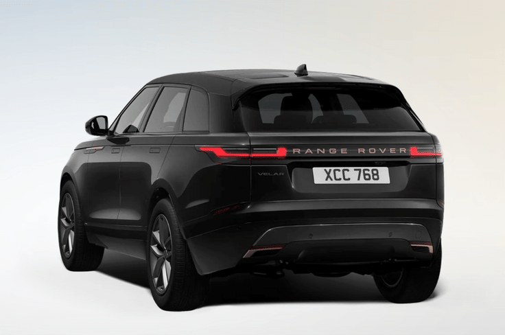 The Autobiography trim stands out with Burnished Copper accents on the bumpers and front fenders, as well as the ‘Range Rover’ lettering on the bonnet and tailgate. Range Rover Velar Autobiography black color rear angle