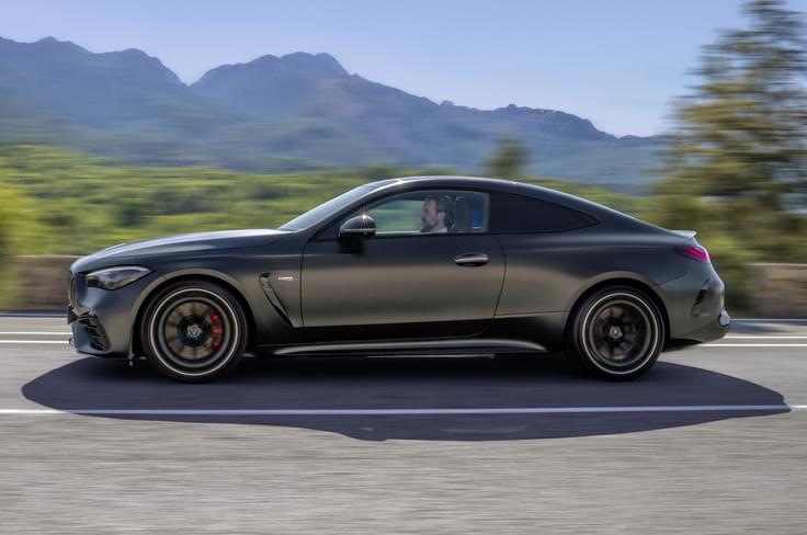 Mercedes AMG CLE 53 Coupe side profile in motion Mercedes AMG CLE 53 Coupe on road